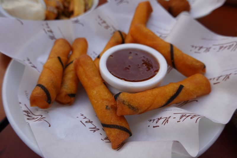 crispy seasoned breadsticks with dipping sauce