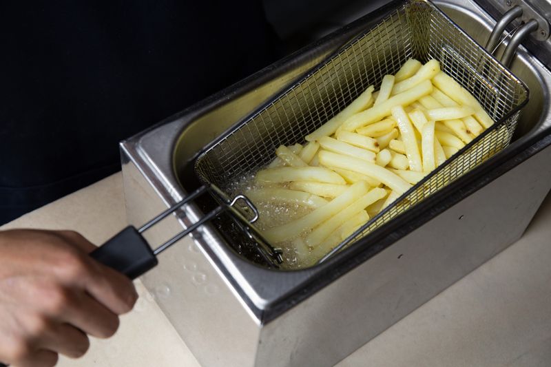 seasoned crispy french fries in a basket